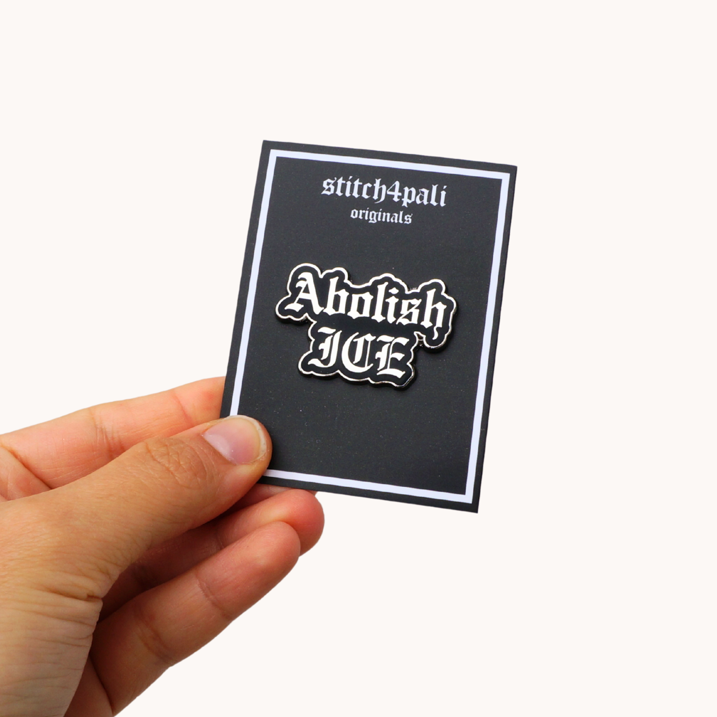 Silver and Black Abolish ICE Pin